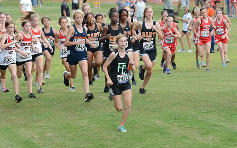 Megan Hightower led the pack in the NEGIAA region cross country championship from the start on her way to a first-place finish Thursday in Hartwell. (Photo by Scoggins)