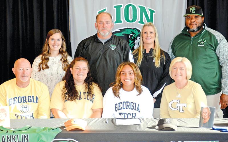 Jayden Gailey signed last week to play softball for Georgia Tech. Pictured at her signing ceremony are (front, from left) grandfather Randall Gailey, mom Haden Gailey Stephens, Jayden, grandmother Lane Gailey, (back) Franklin County High School softball coaching staff Mackenzie Burns, Head Coach Jason Oliver, Cherokee Bell and Demond Rivers. (Photos by Scoggins)
