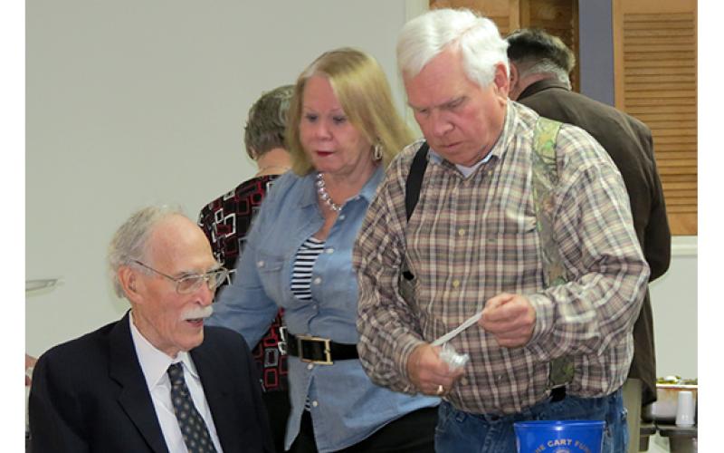 Paul Crawford (right) is pictured with Gen. Eugene Phillips (left) at a dinner in Phillips’ honor before the general moved away from Royston for the last time.