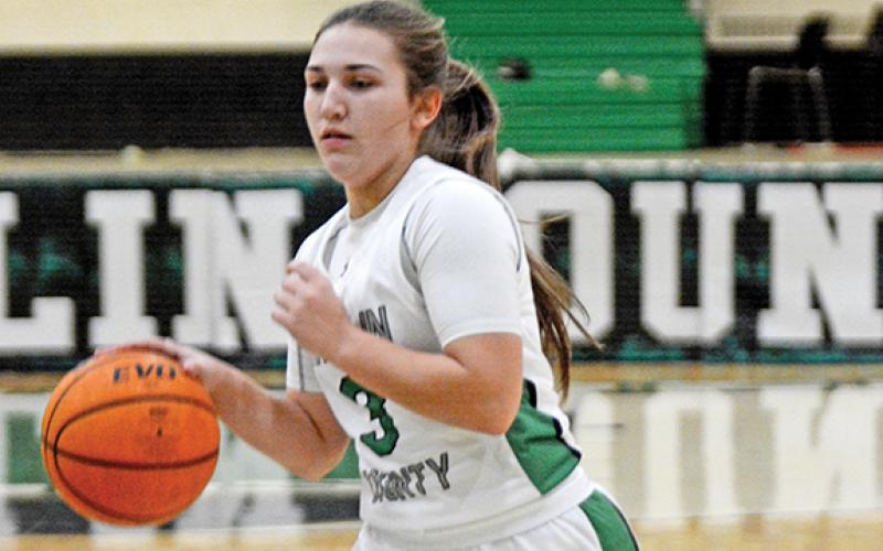 Kayleigh Chappell brings the ball upcourt during action Friday against Dawson County in the Lion’s Den. (Photo by Scoggins)