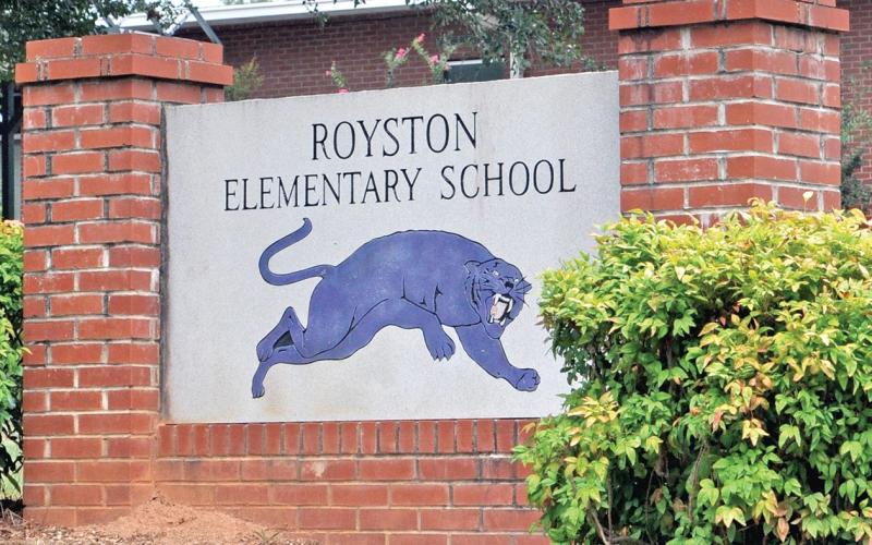 The board adopted a resolution Tuesday for a $21.7 million bond to build a new elementary school to replace the aging Royston Elementary School.
