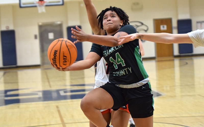Ny'Kerriah Brown goes up for a layup in the region consolation game victory over Hart County. (Photo by Scoggins)