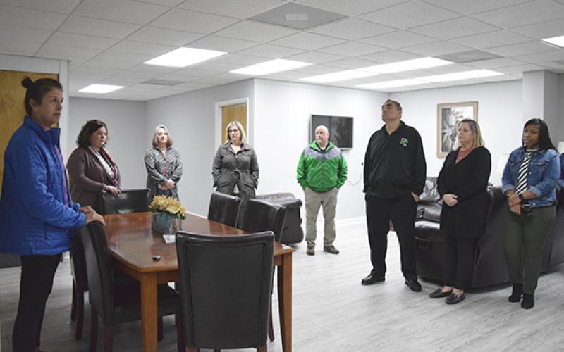 Franklin County School System leaders listen as Jean Davison shares information about Connection for Special Parents. (Photo by Sinclair)