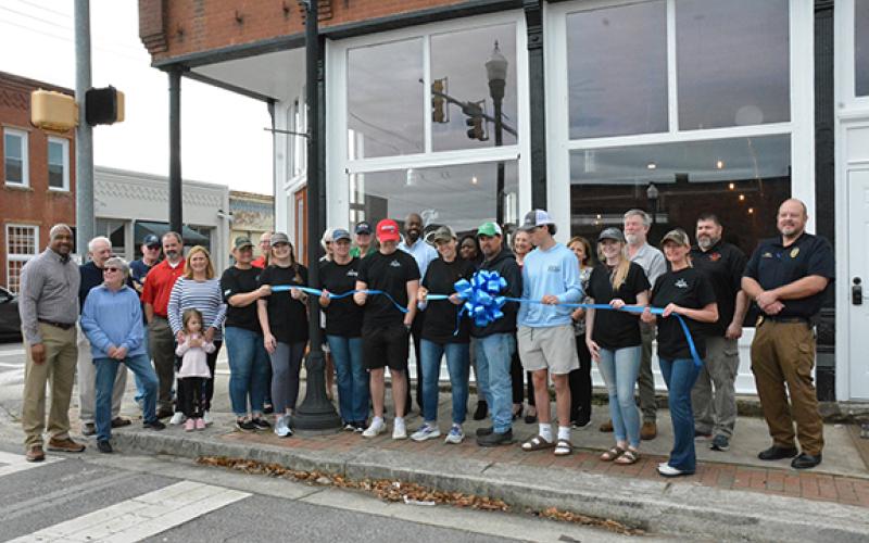 The Old Corner Hardware Store restaurant officially reopened last week after six months worth of renovations due to smoke damage from a downtown fire last year. Owner Kelley Tamplin was joined by her family, staff, city leaders, firefighters and supporters for the event, sponsored by the Franklin County Chamber of Commerce, City of Royston and the Royston Downtown Development Authority. (Photo by Scoggins)