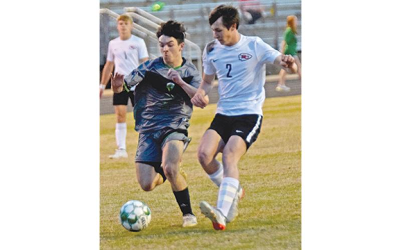 Jaden Willette, who had a goal Tuesday against Stephens County, battles for a ball against an Indians defender. (Photo by Scoggins)