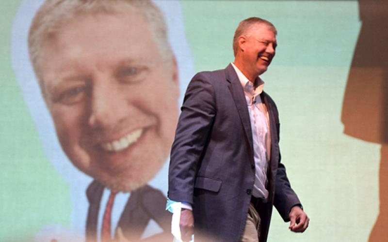 Pioneer RESA Executive Director Justin Old laughs during his speech at Franklin County Schools' Convocation ceremony Monday. (Photo by Scoggins)