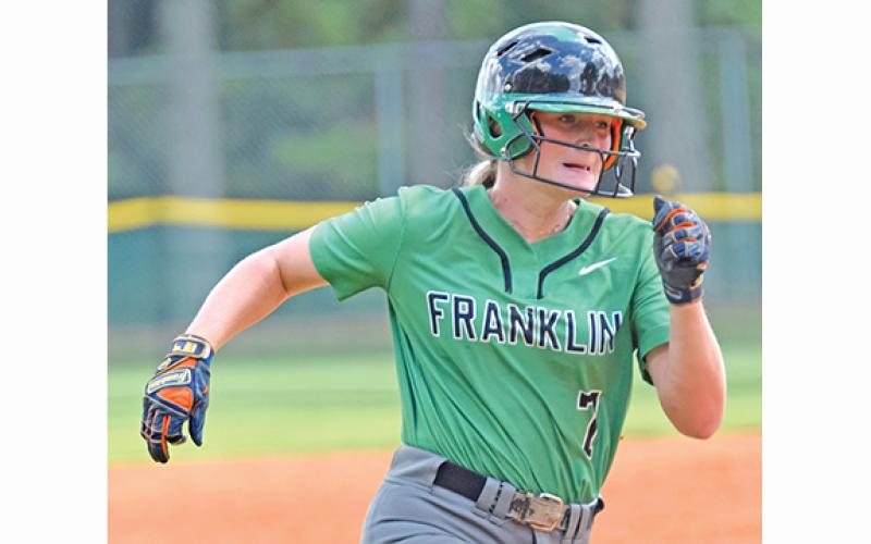 Journey Roberts heads toward the plate during action Saturday against Lanier in a tournament held in Winder. (Photo by Scoggins)