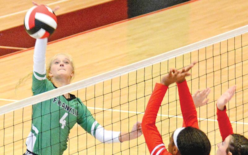 Jordis Haselden spikes a ball in action against Stephens County last season.