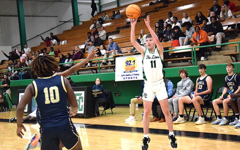 Bentley Huff (pictured) and Frae’Quane Wilkins had 25 points each in a victory over Seneca, S.C., last week. (Photos by Scoggins)