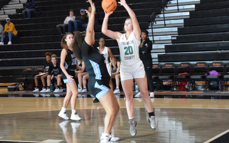 Journey Roberts puts up a shot in tournament action Tuesday against Daniel, S.C. (Photos by Scoggins)