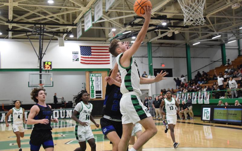Jachin Frazier lays the ball into the basket Tuesday against Banks County. (Photos by Scoggins)
