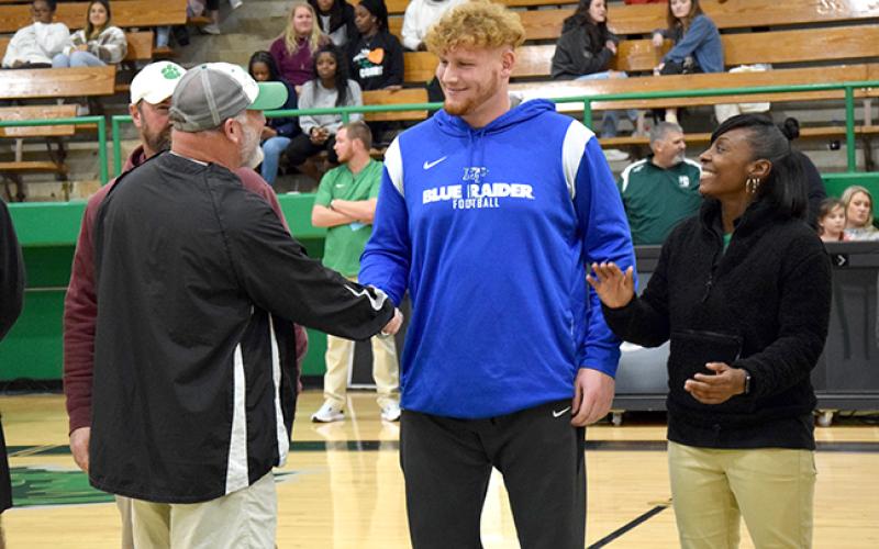 Former Franklin County Lion Keylan “Red” Rutledge received his state shot put championship ring in a ceremony Thursday in the Lion’s Den. Rutledge won the Class AAA state shot put title in May with a throw of 53’4” on his last attempt. The throw was 2’5” farther than Rutledge had ever thrown. Rutledge, who was also a standout football and basketball player for the Lions, is now a starting offensive lineman for Middle Tennessee State University, where he was named to the C-USA All-Freshman Team.