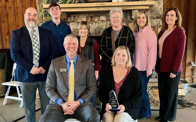 The late Chris Forrer's family and members of the Franklin County School System attended an awards ceremony last week where Forrer was posthumously awarded the Pioneer in Education Award by Pioneer RESA.