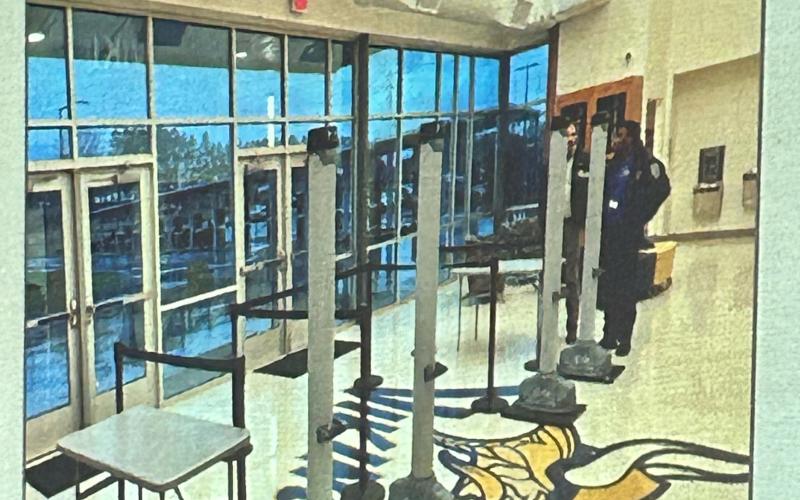 A photo included in a Powerpoint presentation Tuesday at a school safety forum shows new weapon detection devices like the ones that will be purchased and installed by the Franklin County School System. (Photo by Raese)