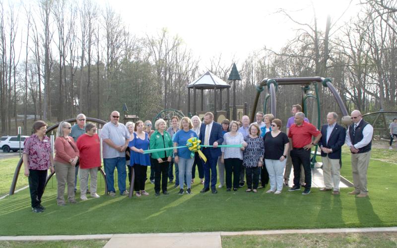 The Pilot Club of Lavonia cut the ribbon on a handicapped-accessible addition to the playground at Lavonia Memorial Park Monday. Club members were joined by city officials for the ceremony. The club raised money for the addition in conjunction with the City of Lavonia. (Photos by Raese)