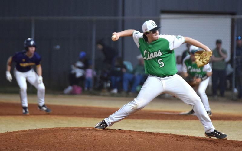 Senior pitcher Duncan Beasley delivers a pitch earlier this season against Prince Avenue Christian.