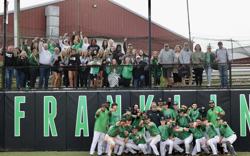 The Franklin County Lions baseball team celebrates with their fans after clinching a first-round state playoff series win Tuesday over Dawson County in the state playoffs. The Lions will be back in action Saturday against Adairsville. (Photo by Rylee Sosebee)
