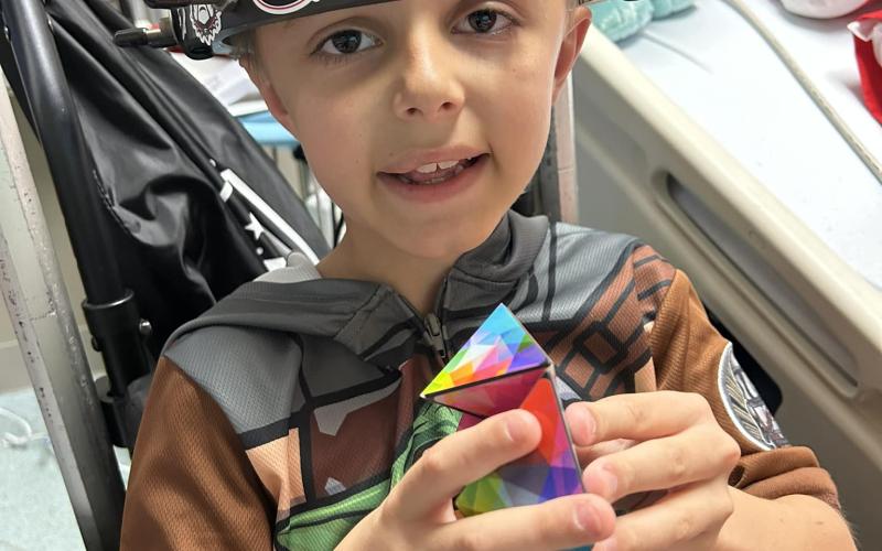 Alex Adams, a young scoliosis patient, underwent a procedure at Childrens Hospital of Atlanta using a halo device to help his condition.