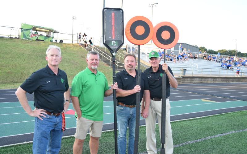 Former football players gathered, spoke to the current team and were recognized as part of the program’s Alumni Night.
