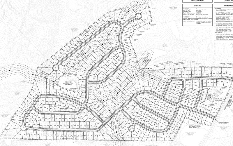 Franklin County commissioners voted Monday to settle a lawsuit with developers who wanted to build a townhome development near Exit 160 on I-85.