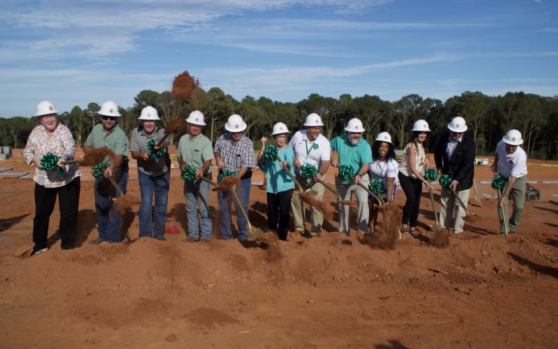 Members of the Franklin County Board of Education, school system administrators and contractors officially break ground Monday on the new South Franklin Elementary School. (Photos by Raese)