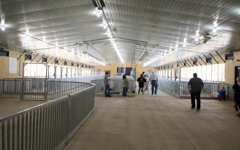 The small animal barn includes pens to house pigs, sheep and goats, an indoor wash rack and a practice ring.