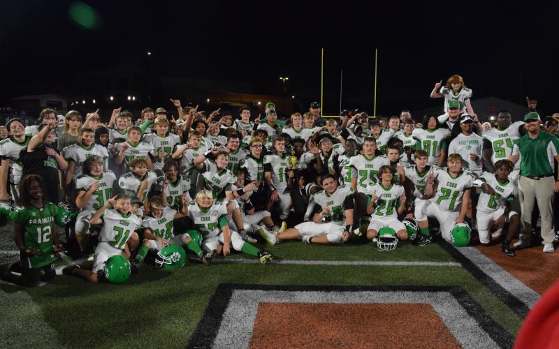 The Franklin County Middle School Cubs celebrate their second consecutive region football championship Thursday in Hartwell. (Photo by Scoggins)