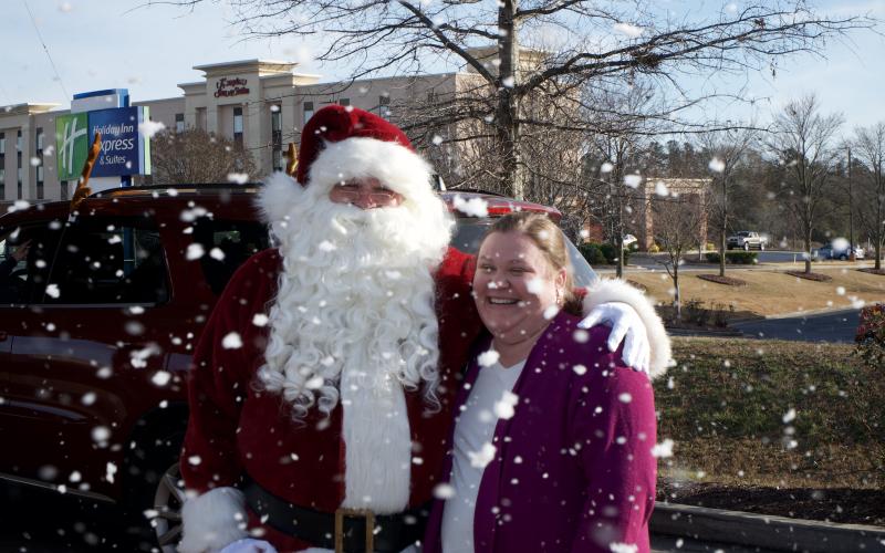 Drive-through customers at the Chick-fil-A in Lavonia enjoyed a winter wonderland with Santa Thursday.