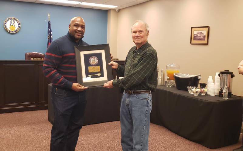 Wayne Braswell and Lee Strickland were presented plaques to commemorate their service on the city council by Mayor Keith Turman.