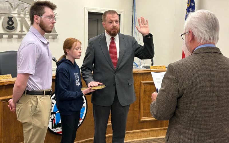 Mayor Courtney Umbehant and council members Eddie Floyd and Andrew Murphy were sworn in to new terms this week.