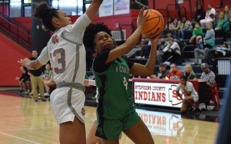 Nykhia Johnson goes up for a lay up against Hart County in the Region 8AAA consolation game Friday in Toccoa. (Photo by Scoggins)