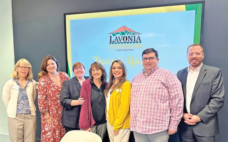 Celebrating the presentation of the City of Lavonia as an Accredited Main Street America are (from left) Kathy Papa of the Georgia Department of Community Affairs, Ellen Hill of Georgia Main Street, Jessica Worthington of the Downtown Development Georgia Main Street, Lavonia DDA Director Barbara Busby, Lavonia Main Street Director Ashley Rose Dodd, Lavonia DDA Chair the Rev. Dr. Hugh Hendrickson and Lavonia Mayor Courtney Umbehant.