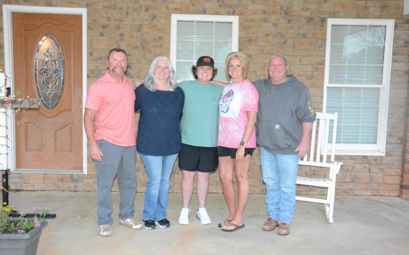 Donors Dusty Morgan and Karen Colwell stand with kidney recipient Mason Kelley and parents Tammy and Brian. (Photo by Eavenson)