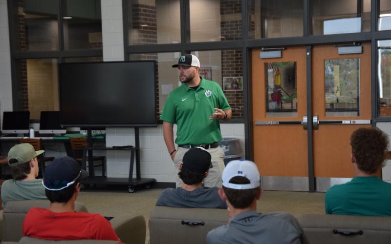 New Head Baseball Coach Ryan Phillips addresses the team after being introduced Thursday by Athletic Director Clay Moore. (Photo by Scoggins)