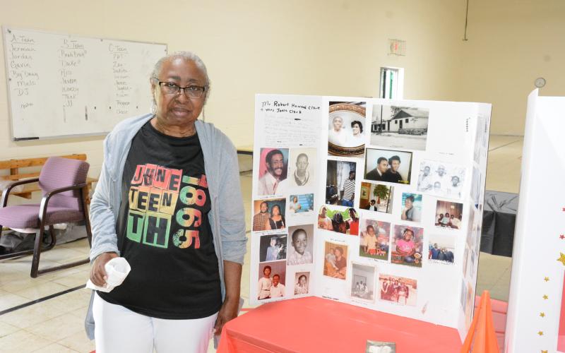 Janie Clark Richard (above) enjoyed the family history displays at Saturday’s Juneteenth celebration at the Spring Street Gym.