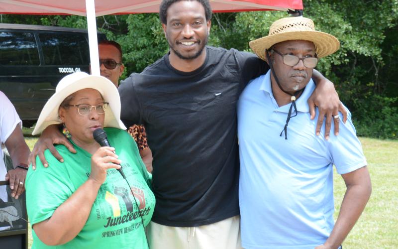 Lavonia Juneteenth celebration organizer Linda Barnes, speaker Demario “DayDay” Mayfield and honoree William Ware were among those taking part in the county’s inaugural commemoration of the newest federal holiday. (Photo by Eavenson)
