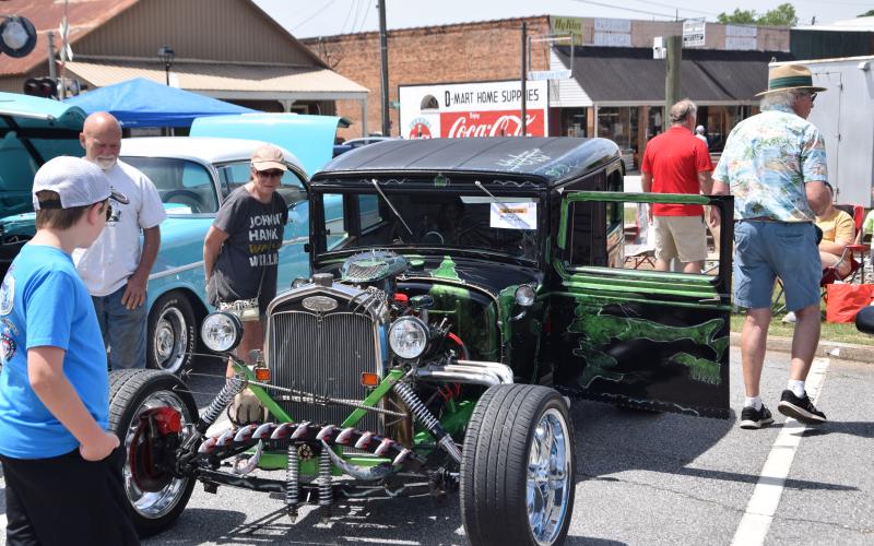 More than $8,000 was raised for Step of Faith Outreach Saturday with the fourth annual Northeast Georgia Hotrod Festival.