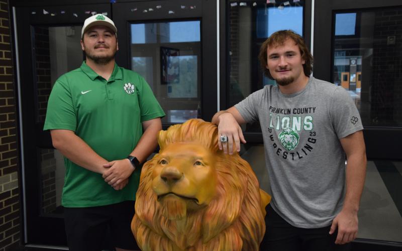 Franklin County Lion wrestler Brady Simms was presented his state championship ring last week at Franklin County High School.