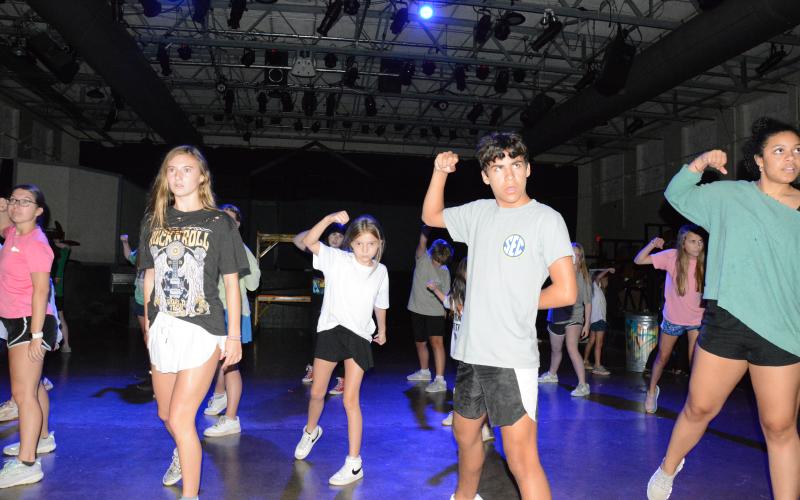 Brock Fowler (right) and Bristol Patterson (left) rehearse a dance routine for the Youth Summer Theater’s upcoming production of “The Descendants – The Musical.” The annual summer camp for young people, sponsored by Franklin Community Players, will perform the Disney musical Friday, Saturday and Sunday at the Lavonia Cultural Center. (Photo by Eavenson)