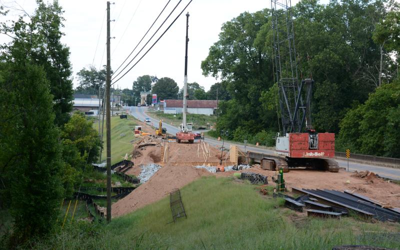 Work is under way on a bridge replacement on Highway 59 in the middle of Carnesville. (Photo by Eavenson)