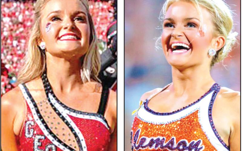 Baylie Jade Phillips has seen the Georgia-Clemson rivalry from both sides. Phillips attended Clemson and twirled with the school’s Tiger Band (right photo) before transferring to the University of Georgia and twirling for the Redcoat Band.