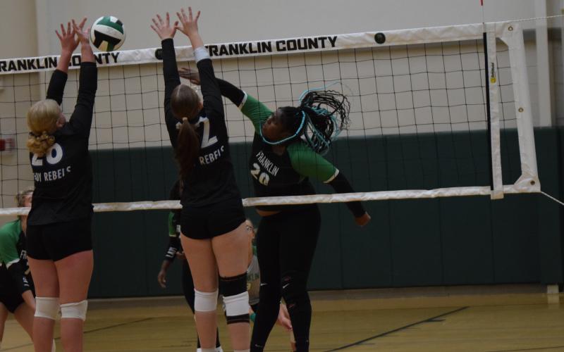 Senior TaKiyah Merriett spikes a ball against Fannin County in the Lady Lions’ season opener Friday at Rocky Ford Park. (Photos by Scoggins)