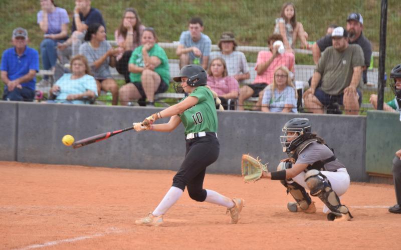Keely Emmons makes contact in a game earlier this season against Elbert County.
