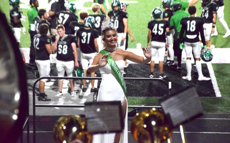 Franklin County High School 2024 Homecoming Queen Haylee Vu conducts the Franklin County Marching Pride Band after she was crowned at halftime of Friday’s game beteen the Lions and West-Oak, S.C. Vu is the Marching Pride’s drum major. (Photo by Rose Scoggins)