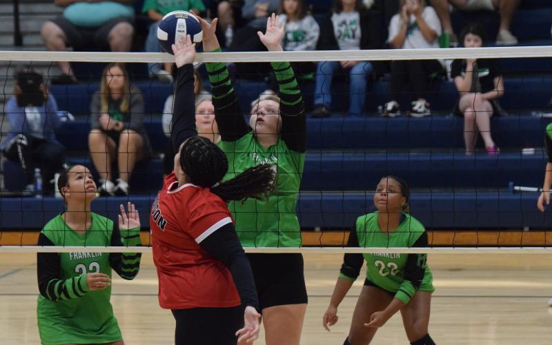 Bristol Johnson (right photo) blocks a shot by Stephens County in FCMS’ first round win.