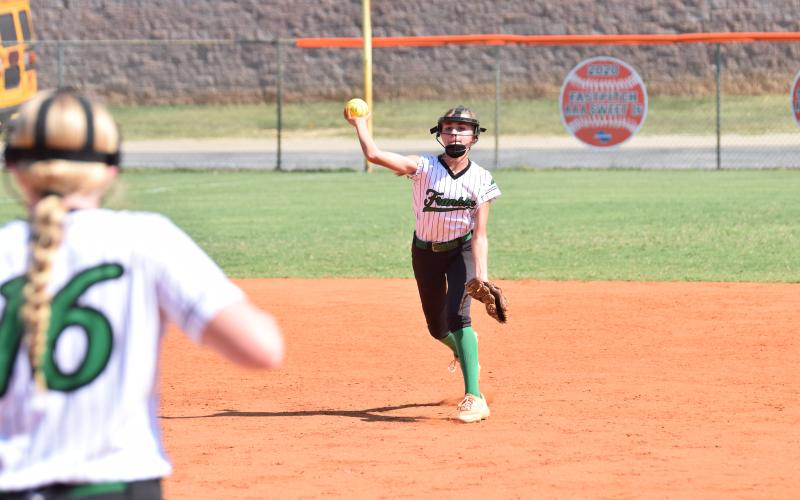 Shortstop Piper Crump throws to first baseman Brailey Randall (above photo) for an out in the Rabun game.