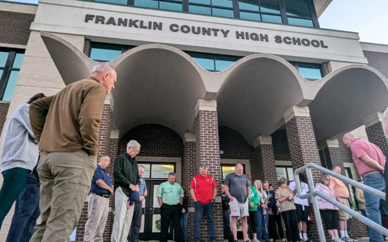 Community members, school officials, parents and students gathered at Franklin County High School – and the other schools in the county – Monday morning for a time of prayer for protection of the schools after campuses were closed Friday following an unfounded threat in the wake of a school shooting in Barrow County. (Photo by Angela Scoggins)