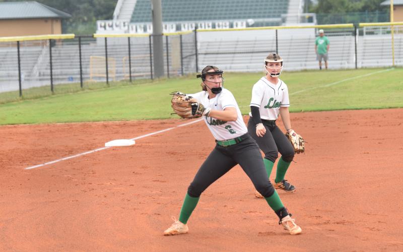 Pitcher McCall Davis prepares to make a throw to first in a game earlier this season. Davis struck out 11 Tuesday in a 6-1 win over Hebron Christian in Dacula.