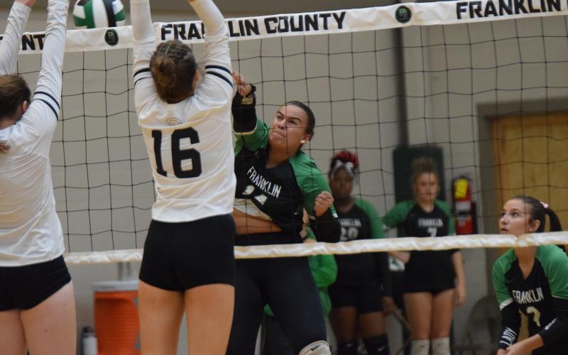 Kallie Thrift smashes the ball in action Thursday against Commerce at Rocky Ford Park.