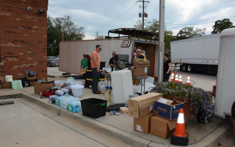 The parking lot of the Lavonia Police Department filling up with trailers loaded down with donated supplies that will be taken today to Avery County, N.C. (Photo by Eavenson)
